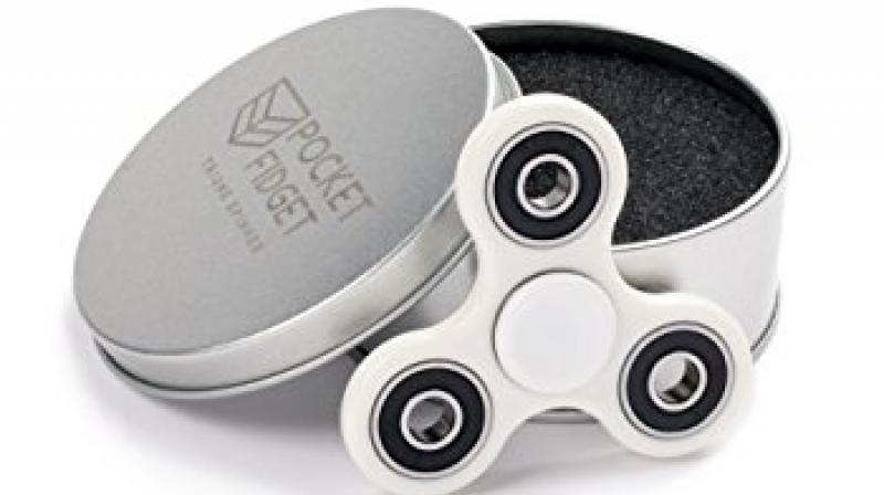 Fidget spinners have become the must-have toy for youngsters, with retailers quickly selling out. (Image: Amazon)