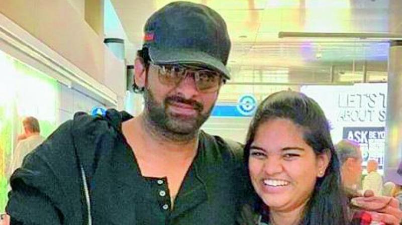 Soon after taking the picture with Prabhas, the overjoyed fan who just wanted to touch his cheek, lightly slapped him instead. But Prabhas didnt react, just walked away