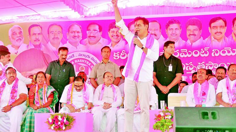 TRS party working president K.T. Rama Rao addresses the MP elections campaign programme at SRR College grounds in Karimnagar on Wednesday. 	 DC