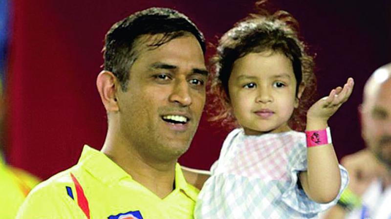 CSK skipper M.S. Dhoni with his daughter Ziva at the post-match ceremony in Mohali on Sunday. (Photo: BCCI)