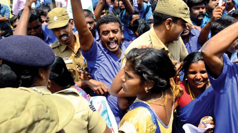 Volunteers of the Aadhi Tamizhar Peravai stage protest condemning the dilution of SC/ST Act.  (Photo: DC)