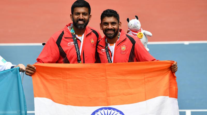 The Pakistani tennis contingent was there to back Rohan Bopanna and Divij Sharma during the mens doubles semifinals at the Jakabaring Tennis Center. The top-seeded Indian pair went on to win the gold medal on Friday. (Photo: AFP)