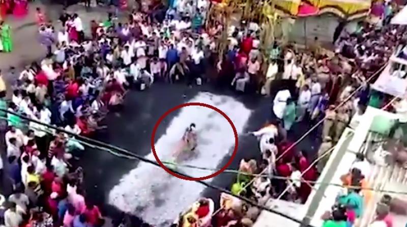 The woman was saved by bystanders (Photo: YouTube)