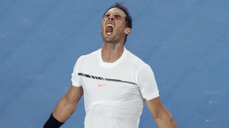 It was a gutsy effort from Rafael Nadal, who was down a service break with a fifth set looming before he broke sixth-seeded Gael Monfils twice to clinch victory. (Photo: AP)