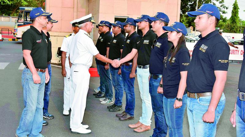 Chief of Staff for Eastern Naval Command Vice-Admiral Atul Kumar Jain interacts with the Navy personnel who were taking part in the Coast to Coast rally during the flag-off ceremony at Eastern Naval Command in Visakhapatnam on Tuesday.