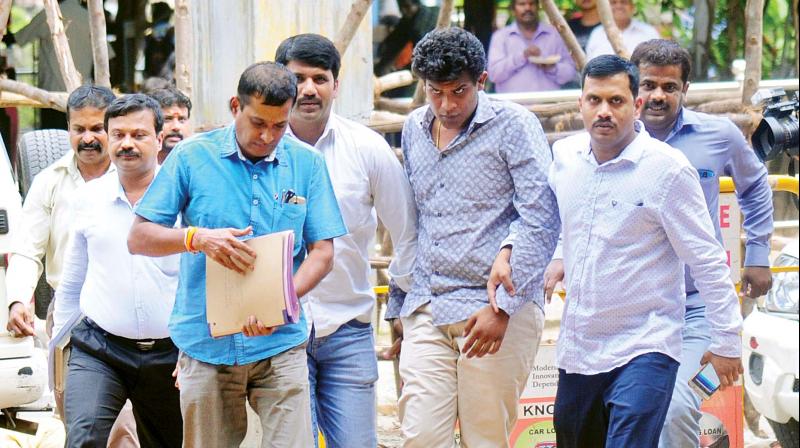 Geetha Vishnu comes out of the First APMM Court premises after the court granted him conditional bail in the Jayanagar accident case, in  Bengaluru on Wednesday 	(Photo: DC)