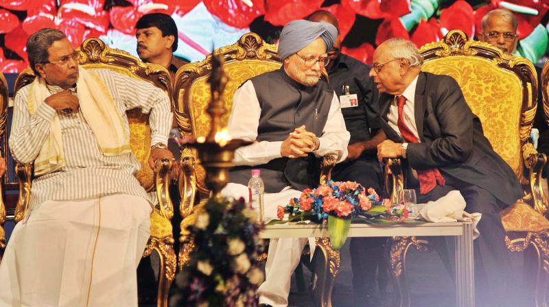 (From Left) Chief Minister Siddaramaiah, former Prime Minister Dr Manmohan Singh, former Governor  RBI Dr C Rangarajan at Dr BR Ambedkar School of Economics at Ambedkar Bhavan in Bengaluru on Wednesday 	(Photo: Shashidhar B)