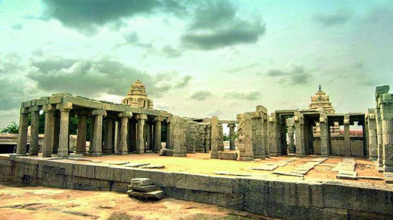 Rajendra Vinod along with architectural photographers, top, on a study to get exclusive photographs to promote Lepakshi through social media and some of his photographs.