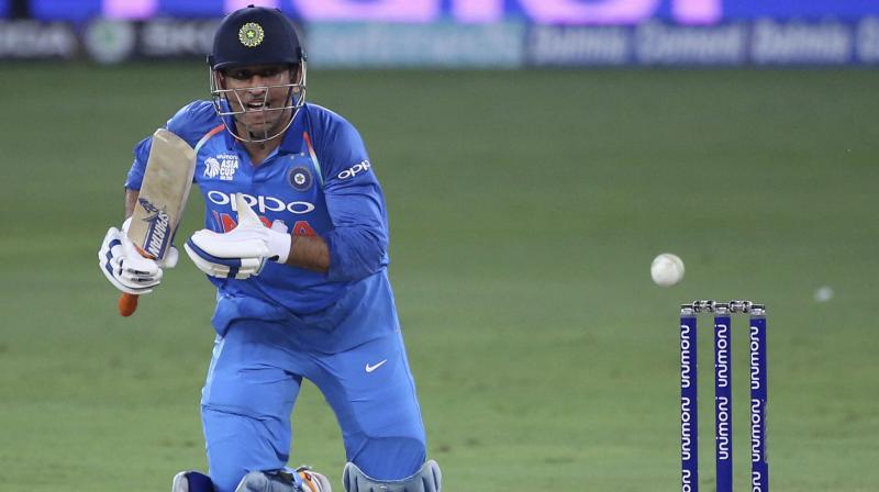 Dhoni and Dinesh Karthik were given leg before by the on-field umpires -- Gregory Brathwaite of West Indies and Anisur Rahaman of Bangladesh -- even though TV replays clearly indicated that the ball was missing the stumps in both the cases. (Photo: AP)