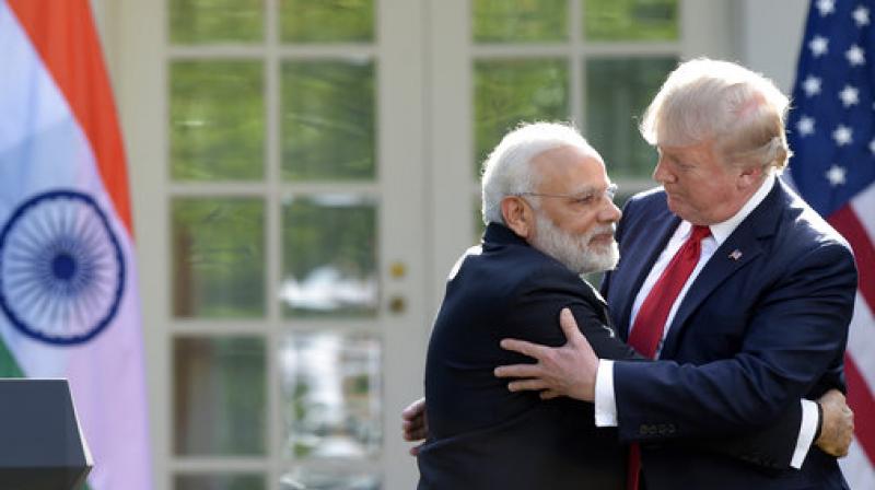 President Donald Trump and Prime Minister Narendra Modi hug while making statements in the Rose Garden of the White House in Washington. (Photo: AP)