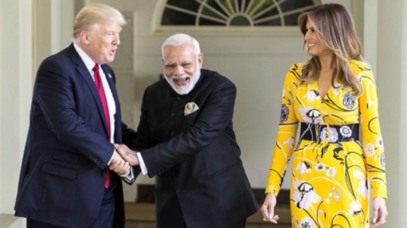 Prime Minister Narendra Modi meeting the President of United States of America (USA), Donald Trump and the first lady of USA, Melania Trump at White House, in Washington. (Photo: PTI)