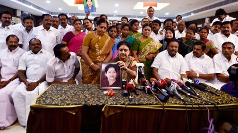 AIADMK General Secretary VK Sasikala along with partys MLAs supporting her during the press conference at the resort in Koovathur at East Coast Road where various AIADMK MLAs are camping to decide on the further course of action in forming new government, outskirts of Chennai on Sunday. (Photo: PTI)