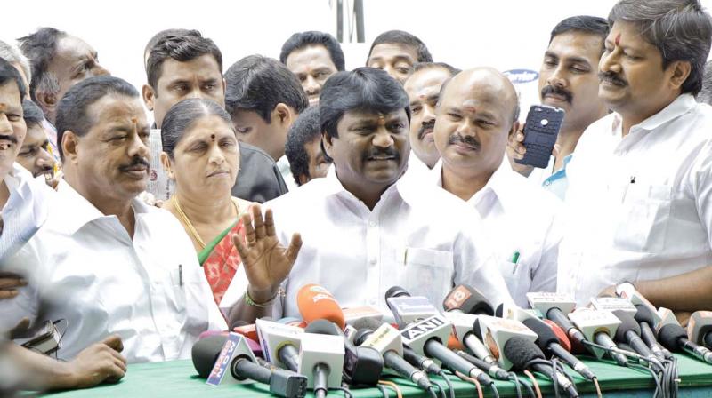 AIADMK MLA N. Murugumaran along with the MLAs supporting chief minister Edappadi Palaniswami make a point against TTV supporter P. Vettrivel during an interaction with media on Wednesday  (Photo: DC)