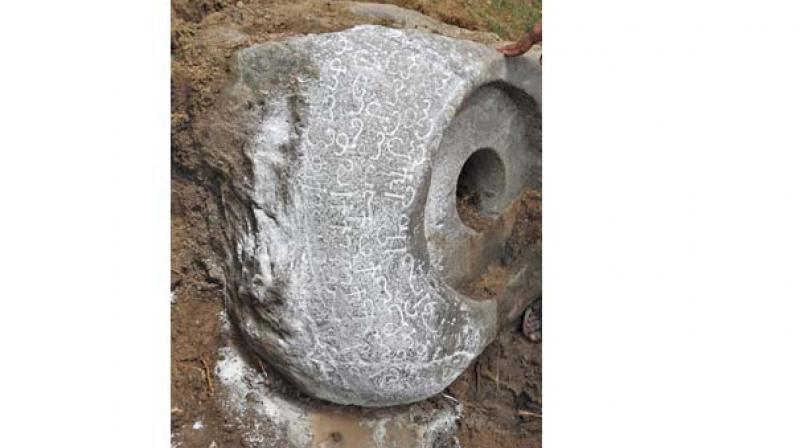 The oil press stone found in Tiruvannamalai district by a team of archaeologists.  	(Image: K.  SenthilNathan)