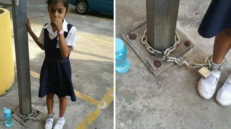 Malaysian mother chains daughter to lamp post, leaves her there as punishment