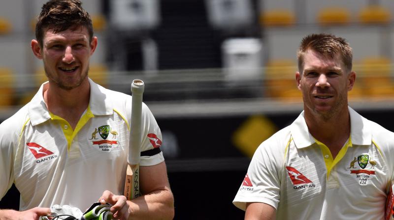 Banned Australian player Cameron Bancroft confirmed David Warner asked him to alter the ball during the tampering scandal in South Africa and said he went along with it \to fit in\. (Photo: AFP)