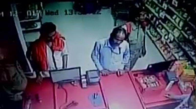 The incident was caught on CCTV camera installed at the shopping mart. (Photo: ANI)