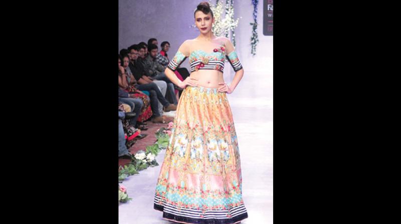 The model seen sporting a floral lehenga.