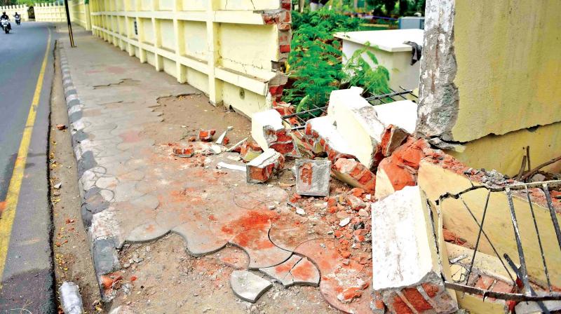 A portion of the compound wall of official quarters of Madras HC Chief Justice Indira Banerjee was damaged due to the mishap. (Photo: DC)