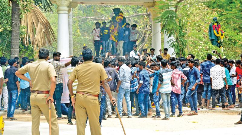 Students of Pachaiyappas College gather to garland the founders statue. (Photo: DC)