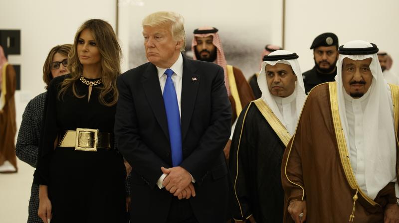 President Donald Trump and first lady Melania Trump visit an art exhibit with Saudi King Salam at the Royal Court Palace in Riyadh. (Photo: AP)