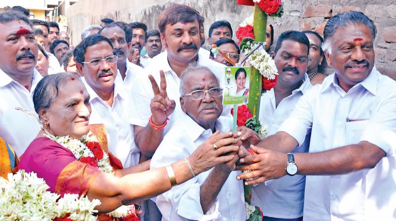 AIADMK Puratchi Thalaivi Amma leader O. Panneerselvam and R K  Nagar candidate E. Madhusudanan after laying foundation for party camp office on Sunday. (Photo: DC)