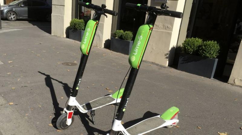 Customers will be able to rent Lime scooters in more than 70 locations in the US and Europe and leave them parked for the next customer to ride. (Photo: AP)