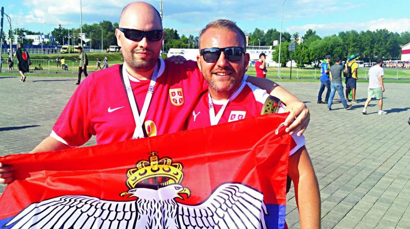 Serbian fan Goran Pentalic (left) with a compatriot ahead of the Brazil-Serbia match.