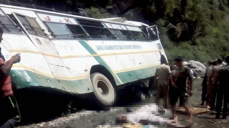 Security personnel carry out rescue work after a bus carrying Amarnath pilgrims falls into a gorge off Jammu-Srinagar National Highway in Ramban district on Sunday. (Photo: PTI)
