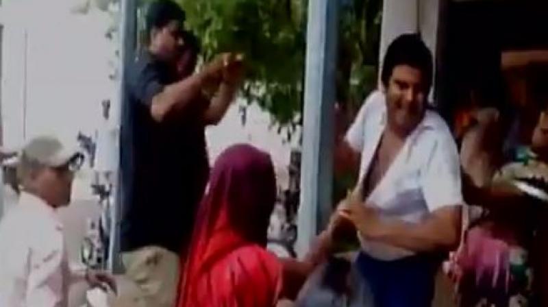 A lawyer in Madhya Pradeshs Guna was beaten up by a group of women for allegedly making sexual advances towards women. (Photo: Videograb)