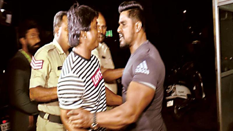 A file picture of the confrontation between actor Duniya Vijay and the gym trainer Maruthi (Photos:Agencies)