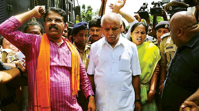 BJP state president B.S. Yeddyurappa and senior leaders of the party R. Ashok, Shobha Karandlaje and others were detained during their protest against state government at Freedom Park in Bengaluru on Friday. (Photo: SHASHIDHAR B.)