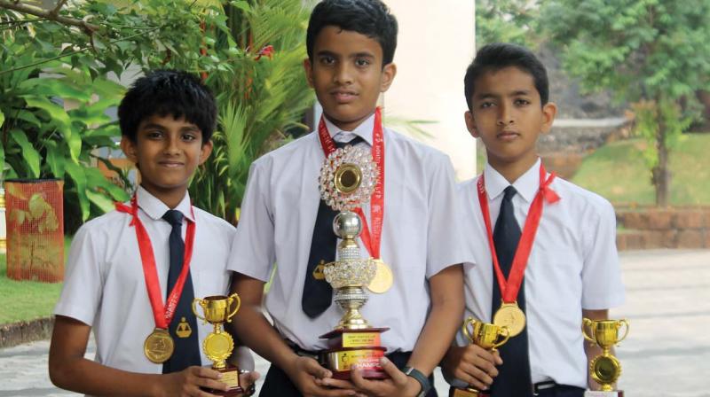 Goutham Praveen, Aditya Robin and Rohan S of Devagiri CMI Public School, who triumped at the Robofest World Championship held by Lawrence Technological University, Michigan, the USA.