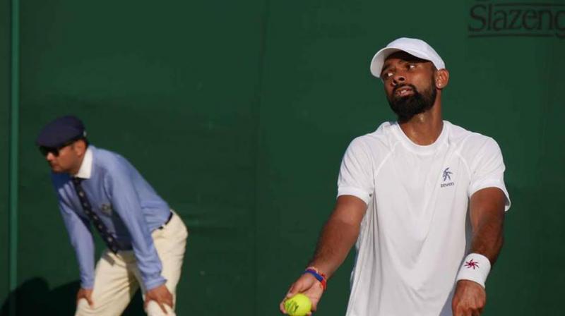 Nedunchezhiyan said their rivals played a lot better in the third set tie-break which changed the momentum and then the match. (Photo: Facebook/Wimbledon)