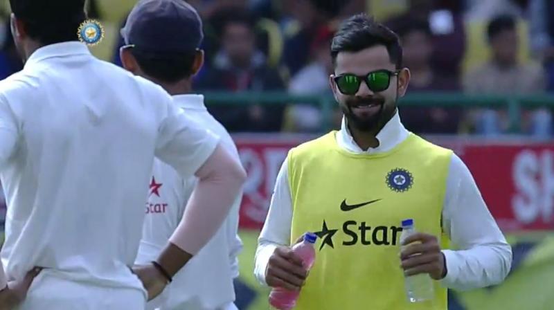 Former Australia star paceman Brett Lee labened Virat Kohli as \the most expensive drinks man in the world\, after seeing the India captain come out on the field during drinks. (Photo: BCCI/ Screengrab)