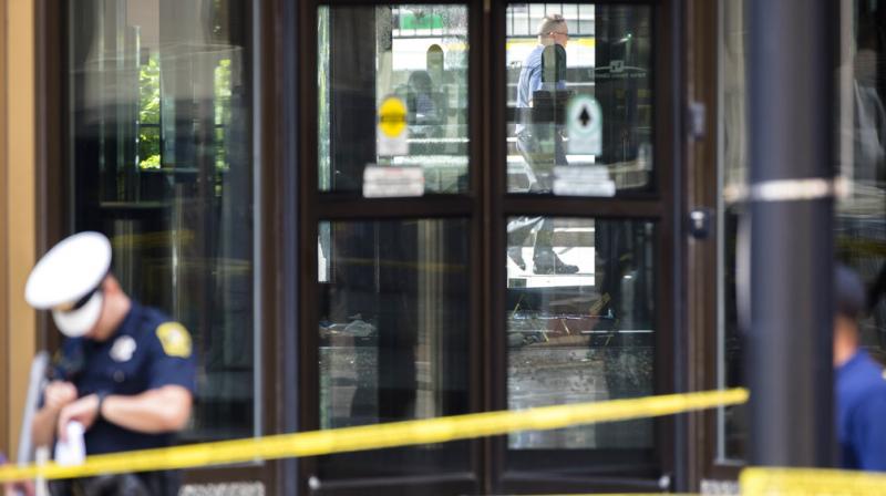Police investigate the scene after a shooting at the Fifth Third Bank building on Fountain Square on Thursday, in downtown Cincinnati. (Photo: AP)