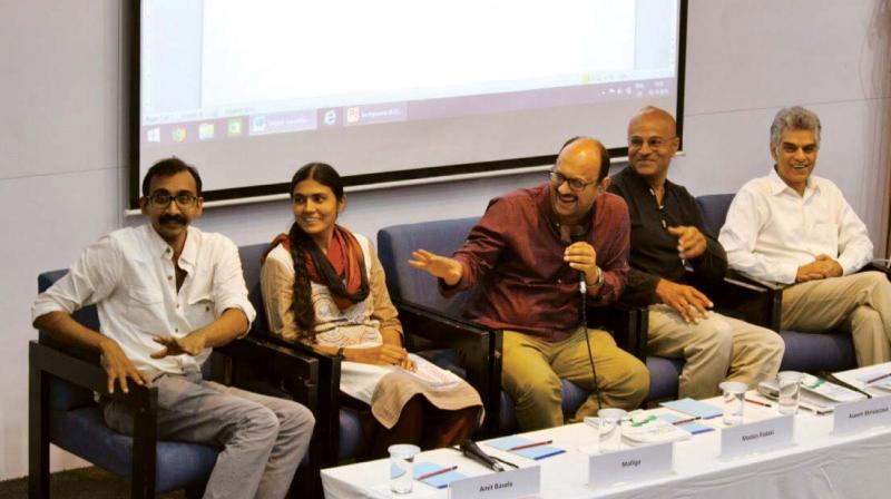 (From left) Amit Basole, Head Centre for Sustainable Employment, Mallige, Youth for Employment, Madan Padaki, Founder & CEO, Bridge (Moderator), Aseem Shrivatsava, Writer & Economist, Mahesh Vyas, Centre of Monitoring, The Indian Economy at a panel discussion in Bengaluru on Monday