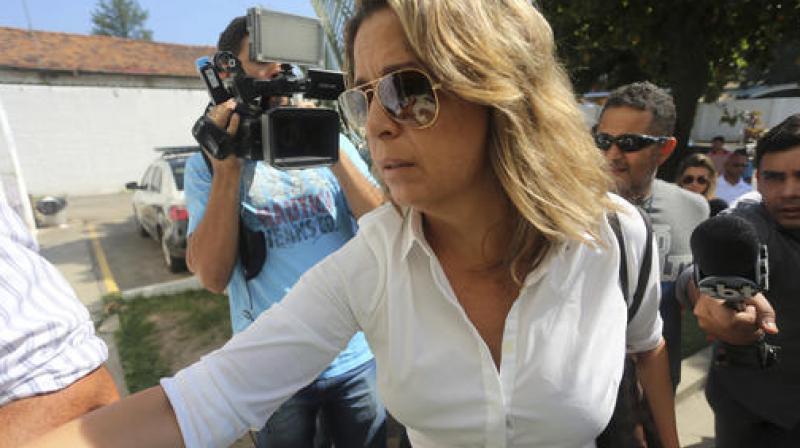 Francoise Amiridis, the wife of Greeces Ambassador to Brazil Kyriakos Amiridis, arrives at a police station to be interrogated in connection with her husbands disappearance. (Photo: AP)