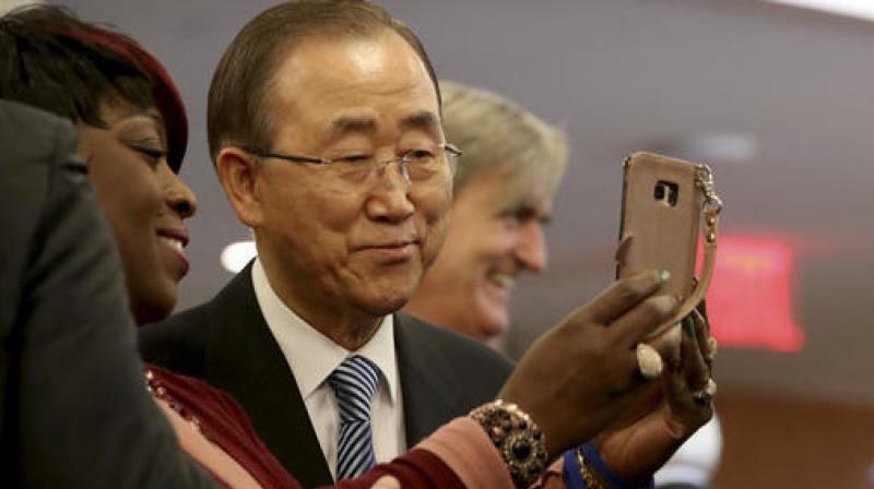 Ban Ki-moon  United Nations Secretary-General Ban Ki-moon, poses for a selfie photo with one of his staff members on his last day at the UN headquarters. (Photo: AP)