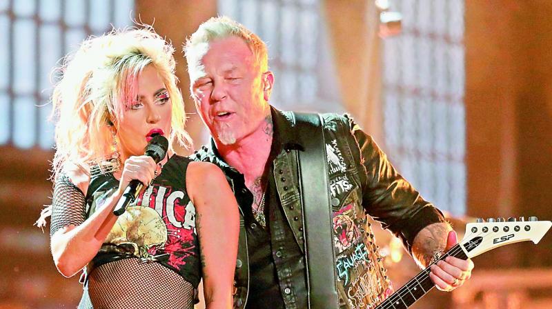 Fiery show: Lady Gaga and Metallicas James Hetfield perform at the Grammy Awards on Sunday night.