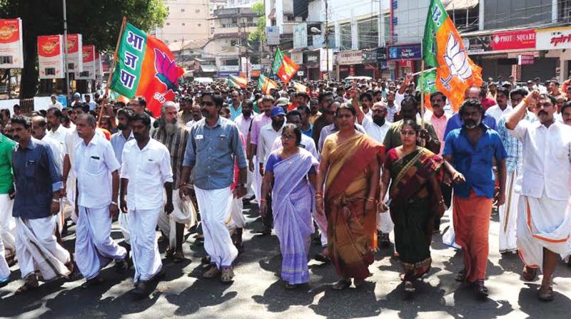 BJP taking out a protest march through Swaraj Round on Monday as a part of the district-wide hartal held on Monday after the murder of a 20-year-old Yuva Morcha worker at Mukkattukara.