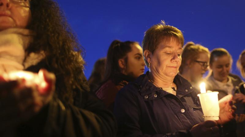 Irish republicans hold a candle lit vigil in West Belfast, Northern Ireland. (Photo AP)