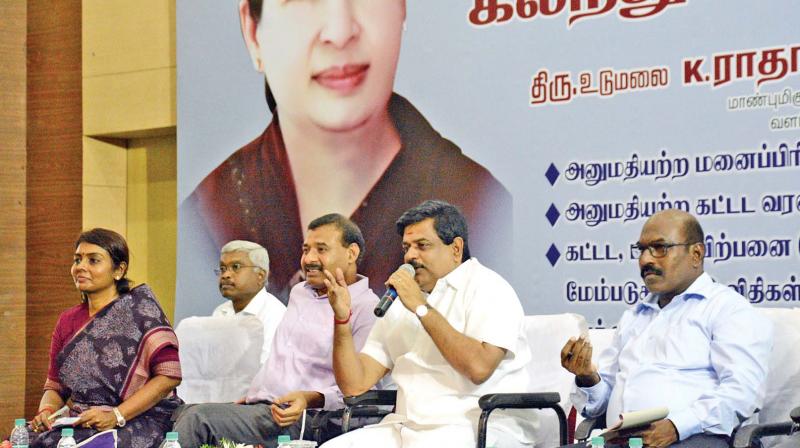 Housing minister Udumalai Radhakrishnan at a  meeting with builders and realty associations. (Photo: DC)