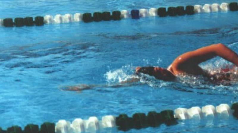 The Karnataka swimmer clocked 2:04.11s to shatter Aravind Ms record of 2:11.30s.