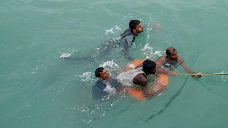 Bangladeshi nationals, who were found adrift at sea over 100 miles away from Bangladeshi city of Chittagong due to Cyclone Mora, were rescued by the Indian Navy on Wednesday. (Photo: PTI)