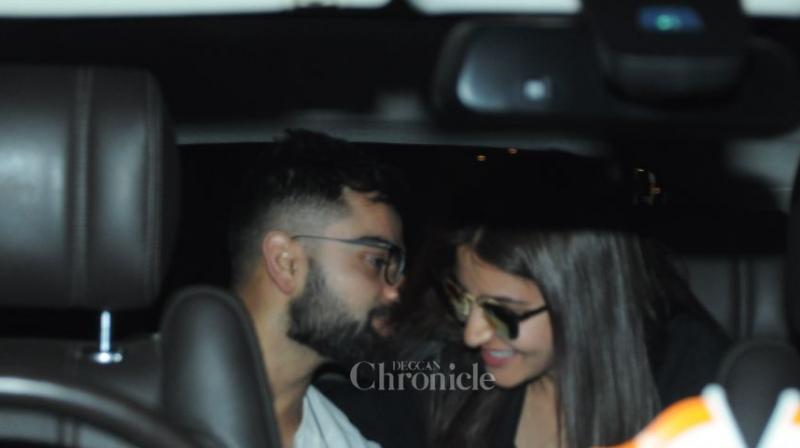 Away from cricket to take some much-needed rest, Indian cricket team skipper Virat Kohli on Sunday went to the airport to receive wife Anushka Sharma. (Photo: Viral Bhayani)