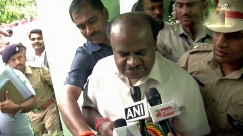 Karnataka Chief Minister HD Kumaraswamy announced the decision to cut petrol and diesel prices by Rs 2 per litre. (Photo: Twitter | ANI)