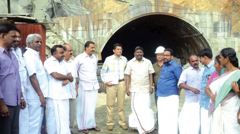 K Rajan, MLA, district collector A. Kowsigha and P.K. Biju, MP, among others visit the Kuthiran Climb twin tunnel work site on Tuesday.