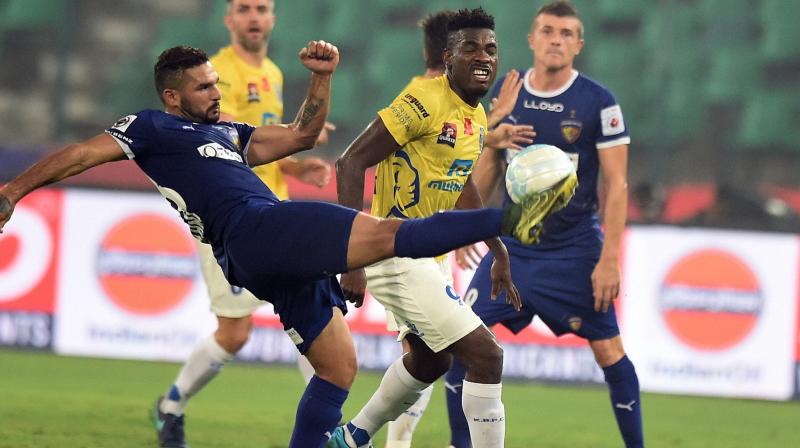 Chennaiyin FC (in Blue jersey) and Kerala Blasters FC (Yellow jersey) vie for the ball during their ISL match at Jawaharlal Nehru Stadium in Chennai on Saturday (Photo: AP)