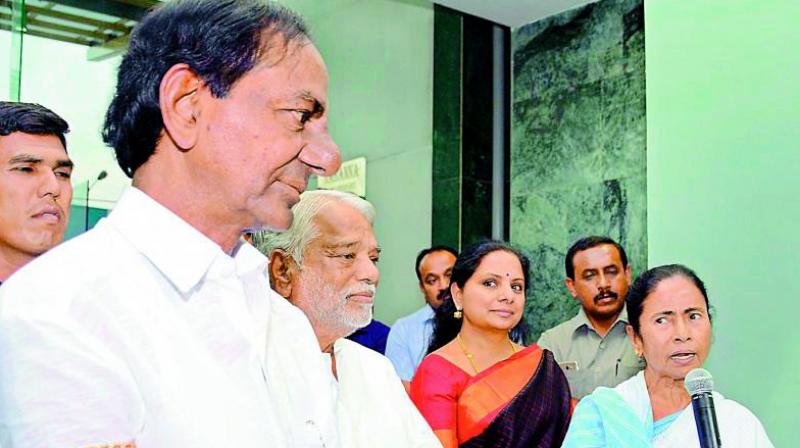 TRS president and TS Chief Minister K. Chandrasekhar Rao, party leaders K. Keshava Rao and K. Kavitha with Trinamul chief and West Bengal Chief Minister Mamata Banerjee in this file picture.